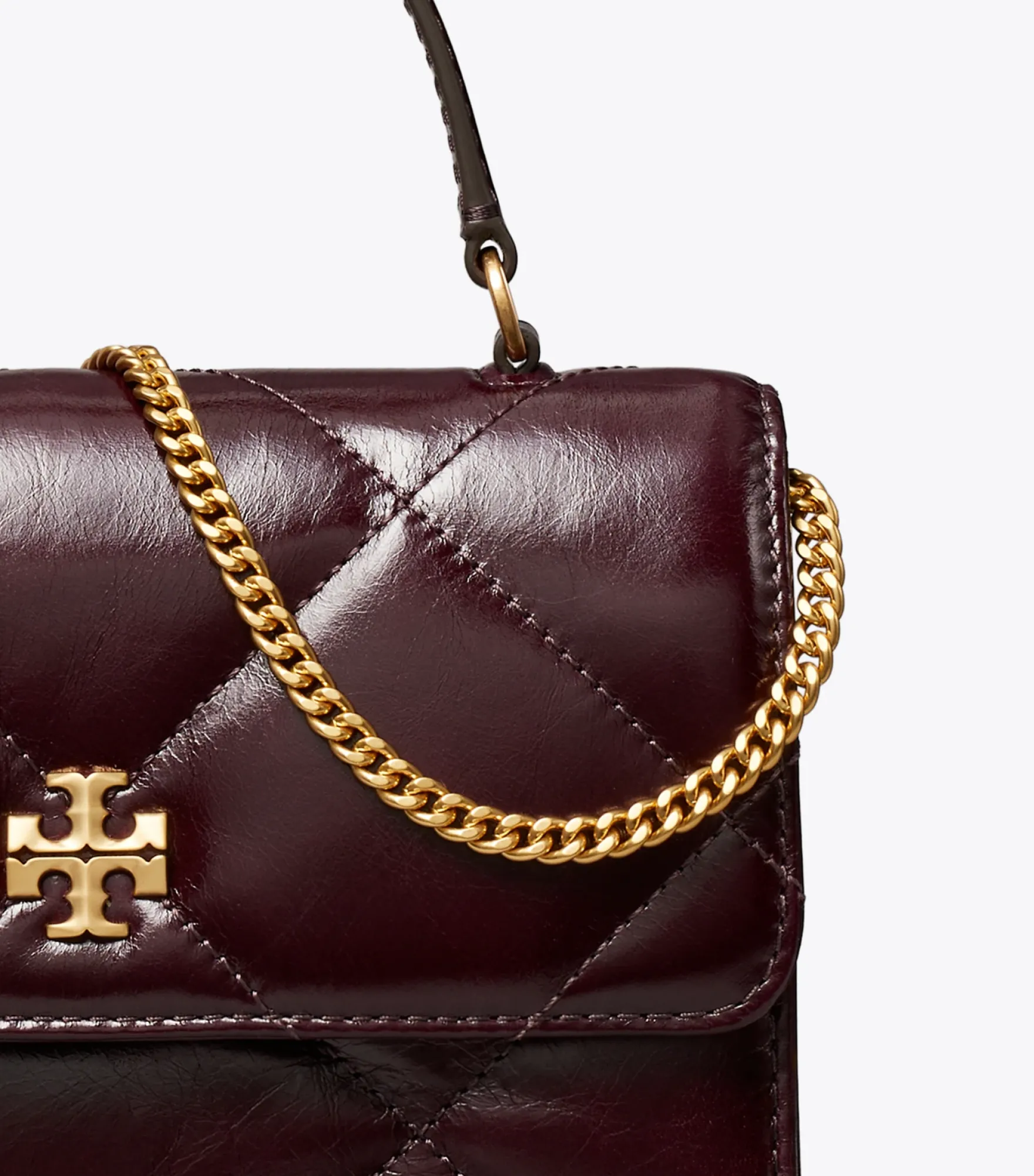 MINI KIRA CROSSBODY BAG IN VINTAGE-OPTIK MIT RAUTENSTEPPUNG UND TRAGEGRIFF OBEN
