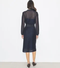 POLOKLEID IN METALLIC-OPTIK