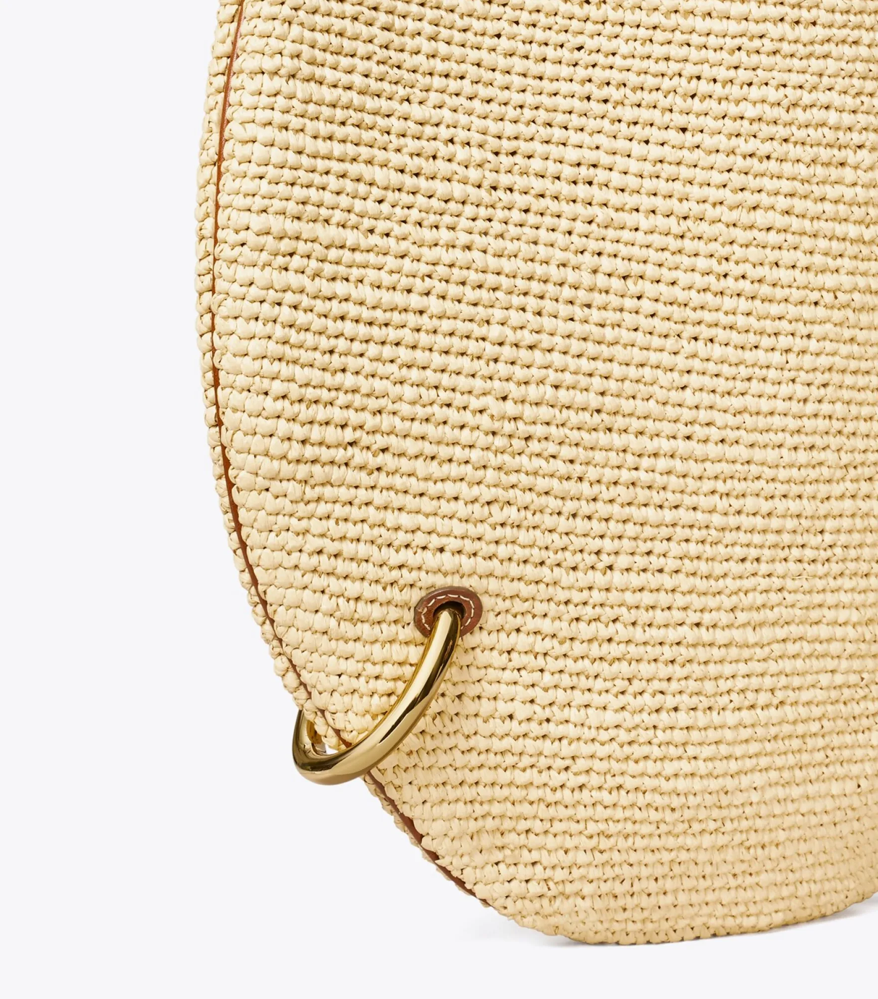 WEICHE STROHTASCHE MIT PIERCINGDETAIL